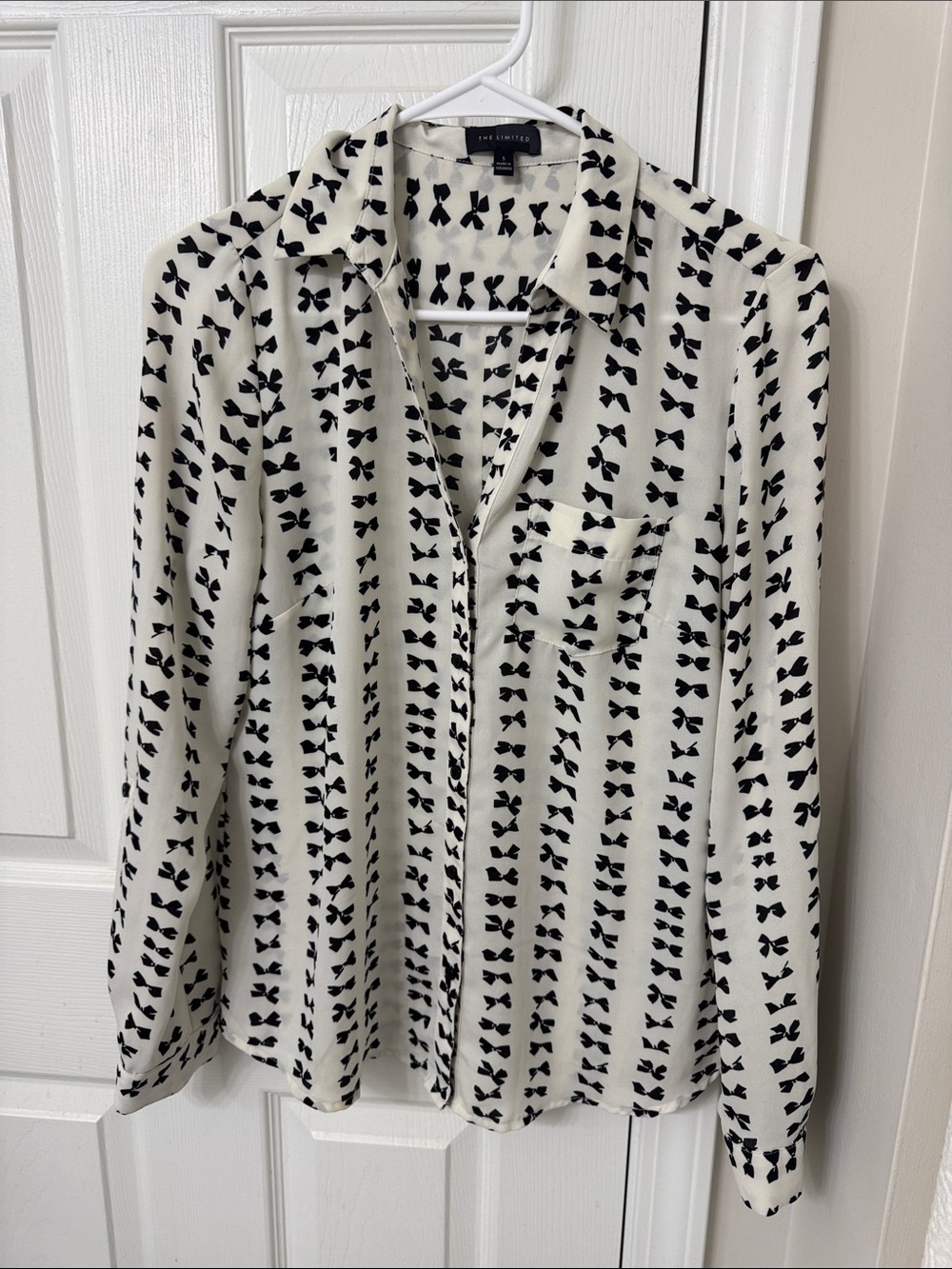 The Limited Cream Blouse with Black Bow Pattern